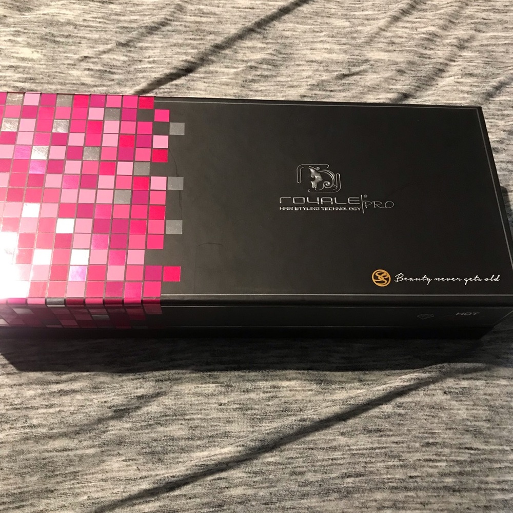 Royale pro flat iron never used. Paid $135